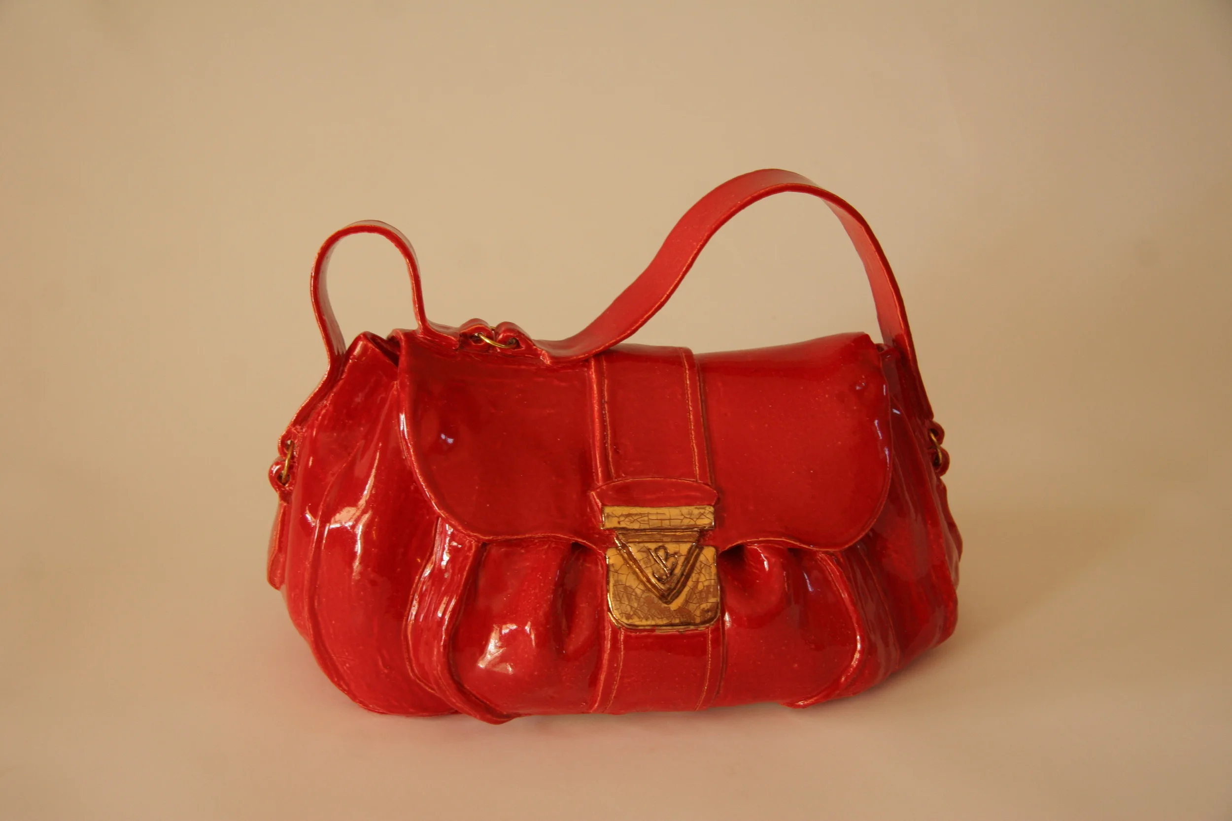   Marilyn    Ceramic and metal rings.    Size: 12.5” x 9.5 x 6  