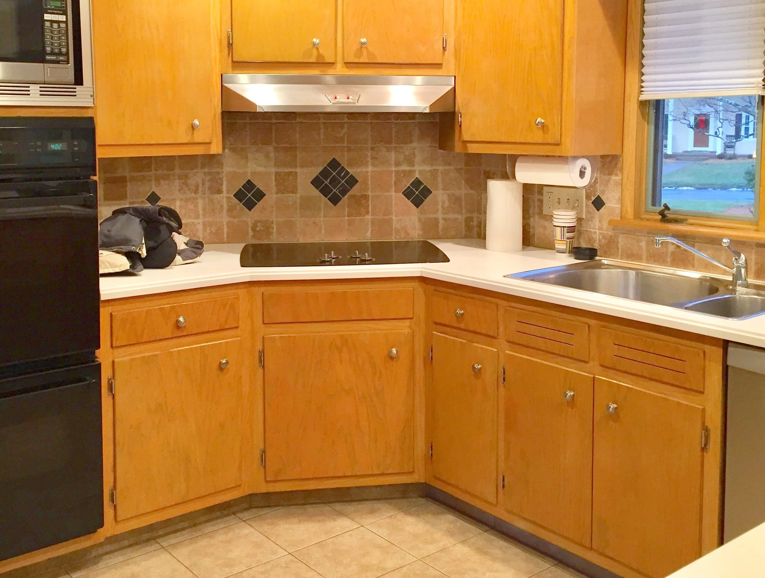 The 90's are calling...they want their backsplash back!