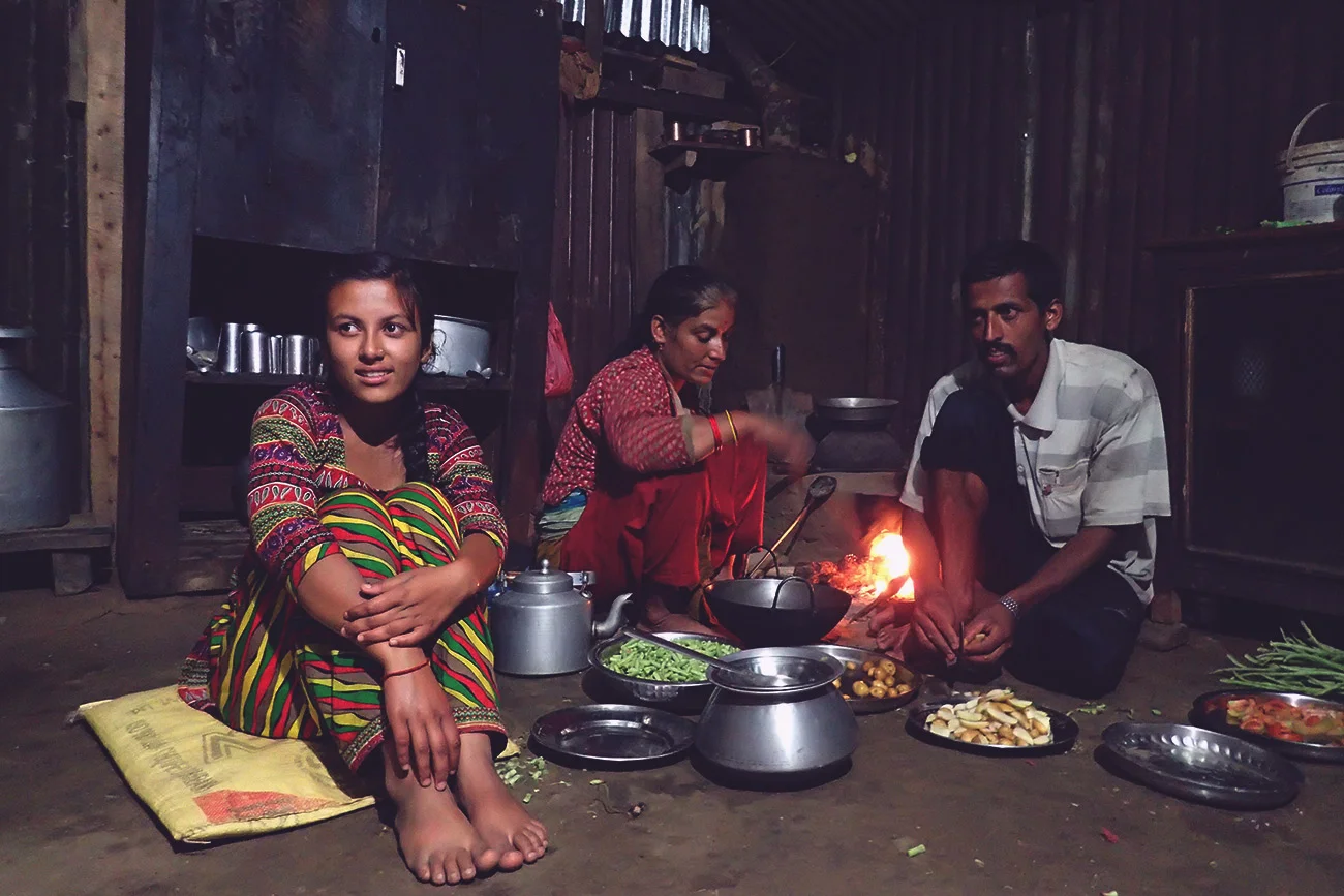 The Gautam family preparing food