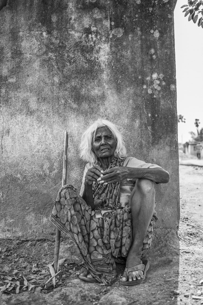 Saroja begs for money.