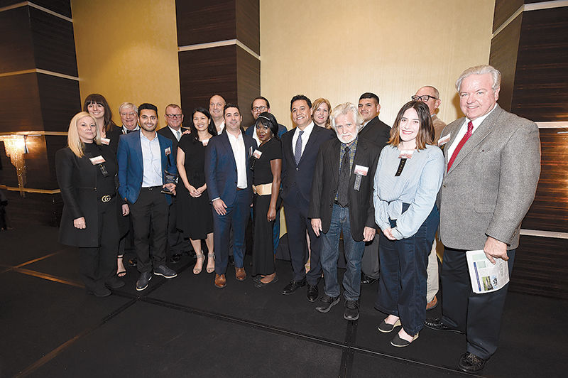Representatives of 10 projects that won 2017 Downtowners of Distinction awards gathered together at a ceremony last week. Photo Credit: Gary Leonard, Downtown Ners