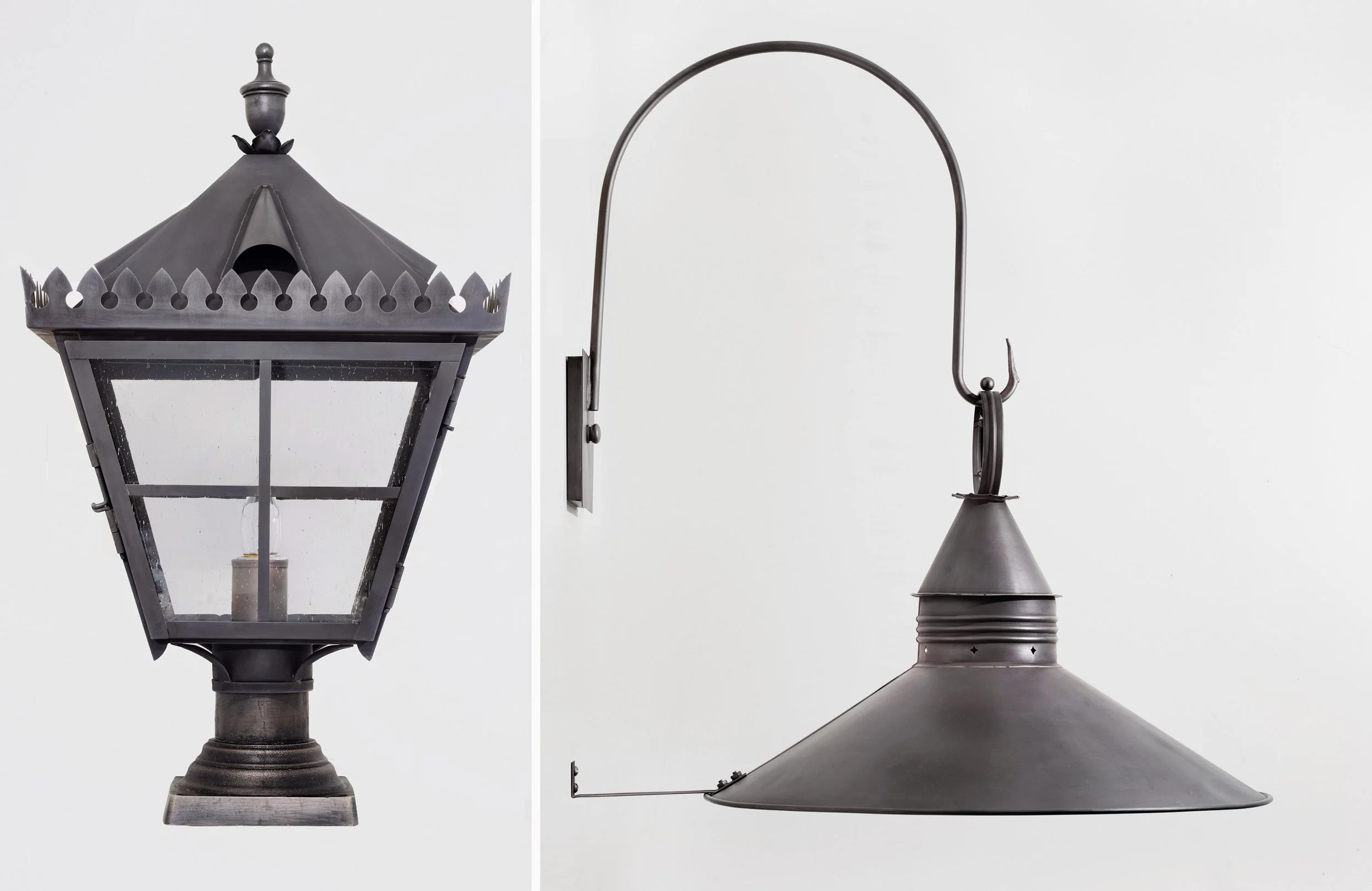 Close-up of two black outdoor lamps against a white background. The lamp on the left is a traditional lantern style with a glass enclosure and a pointed top, while the lamp on the right is a modern, conical design with a curved arm.