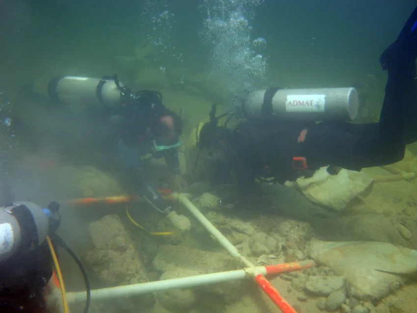 Students being trained on how to measure artefacts on The Tile Wreck