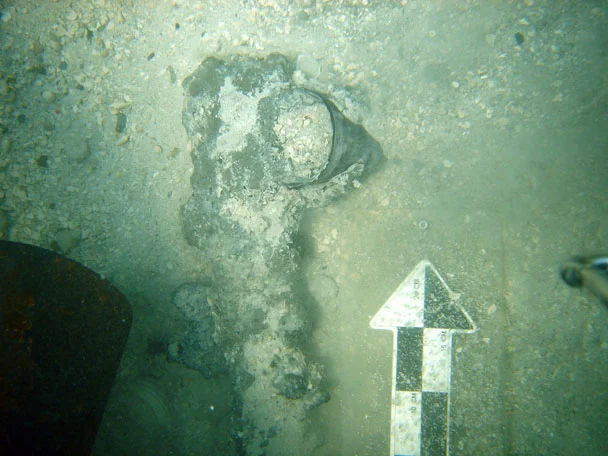 Concretion attach to a piece of French faienceware