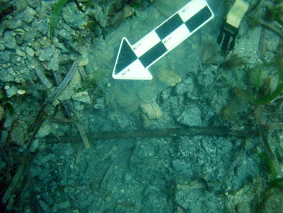 A close up of the bronze bolt.