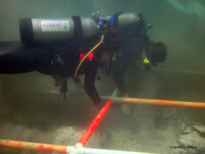 Dr. Spooner in action teaching students ships construction on the wreck site