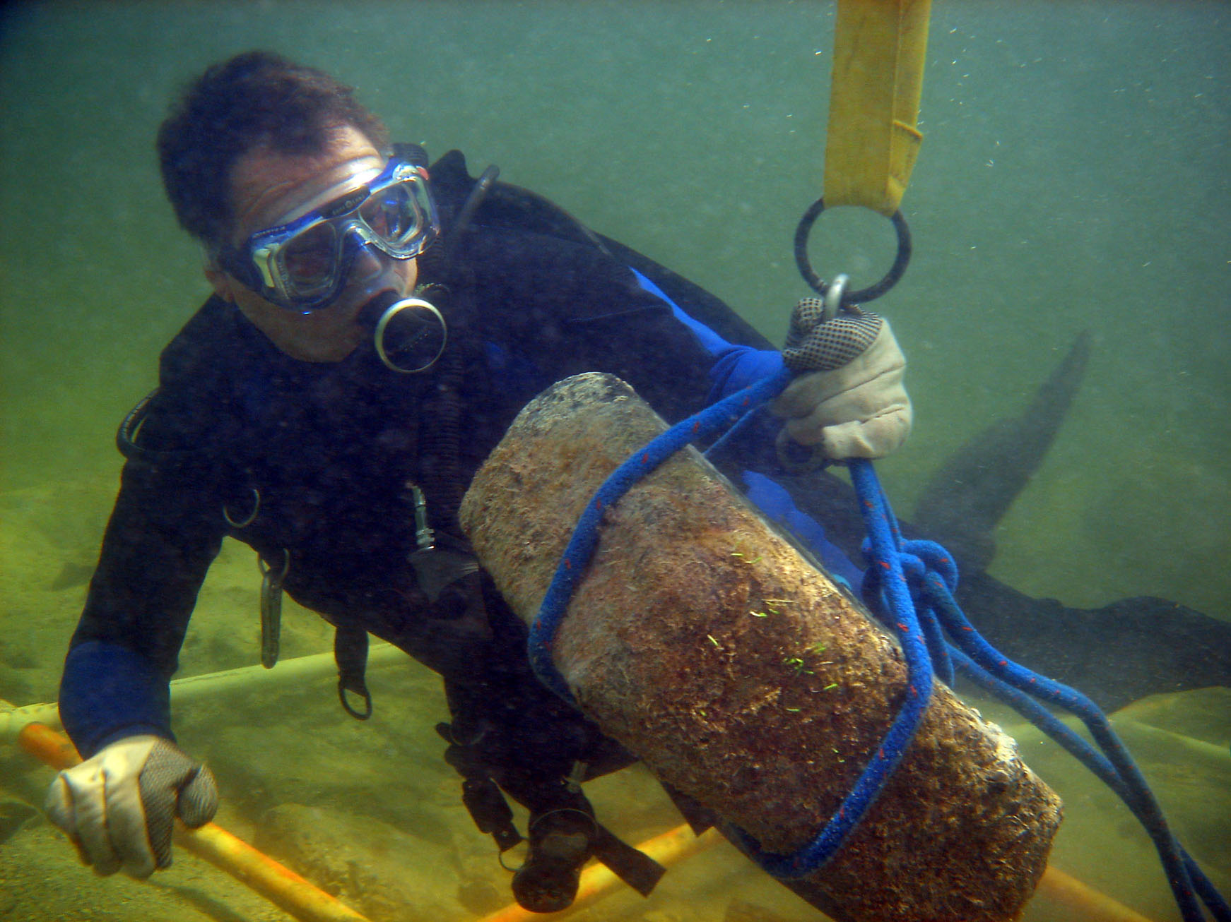 John at work repositioning and weighing one of the granite blocks on The Tile Wreck 2008