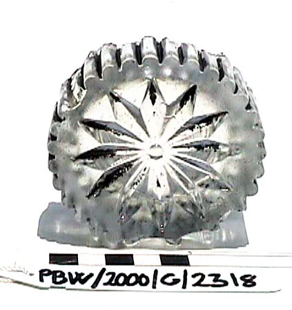 One of the broken bases of a French lead crystal wiskey tumbler