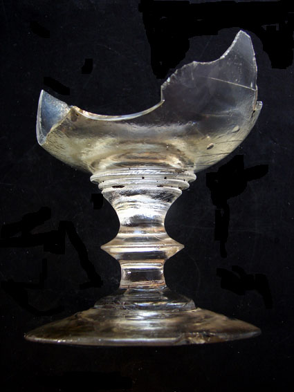  One of the broken lead crystal French wine goblets, smashed by the looters 