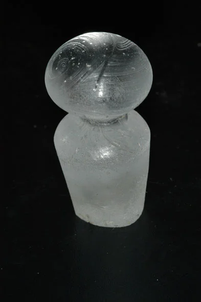 A lead crystal decanter stopper. Each was made to fit a specific bottle