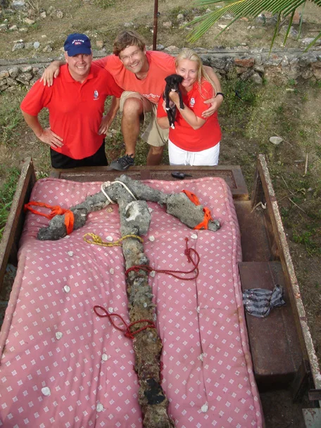 Patrick Enlow, Dr. Simon Q. Spooner, Isabella and Christine Nielsen, with the anchor raised from in front of Isabela.