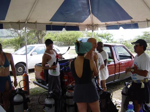 Conference delegates prepare to go diving on The White House Bay Wreck.