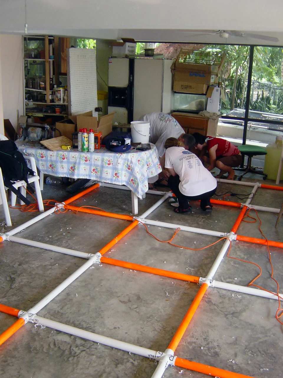 Drilling the locking holes on the grid cross pieces