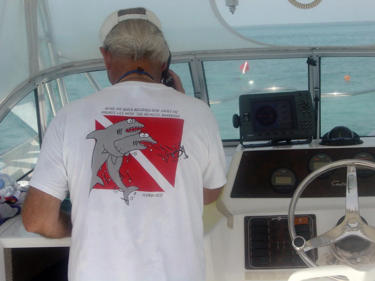 Capt. "JJ" rings in the dive details to NOAA