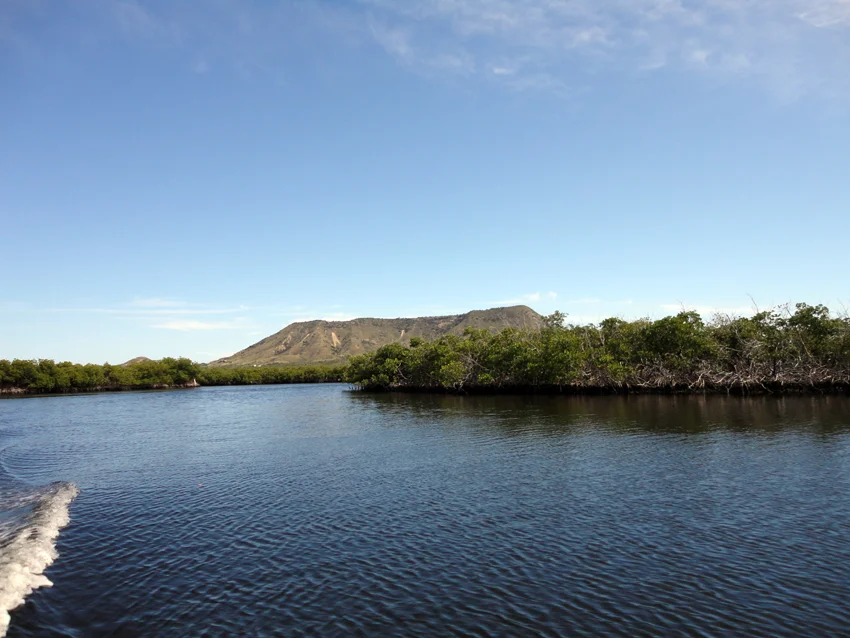 As the channel meanders back and forth we can see the side of El Morro in the distance