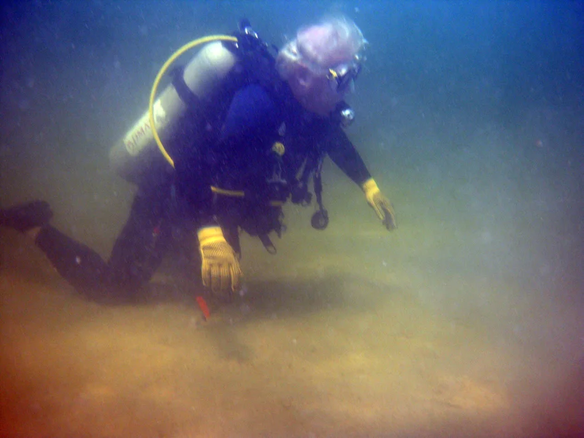Ron in the survey area where the magnetometer gave a hit and also where the last grenade was located