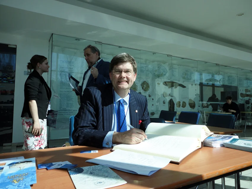 Dr Spooner signing the Speakers book 