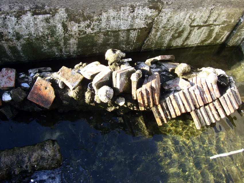 Cannon No: 2 from The Tile Wreck which has 67 terracotta floor tiles concreted to it having been drawn and cleaned by the students