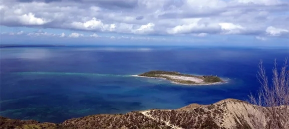 The view across Monte Cristi Bay, with Cabrita Island in the foreground.