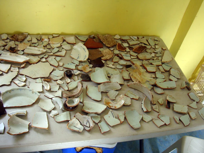 The Faienceware sherds from The Faience wreck, with the numbering complete prior to being wrapped in tissue paper