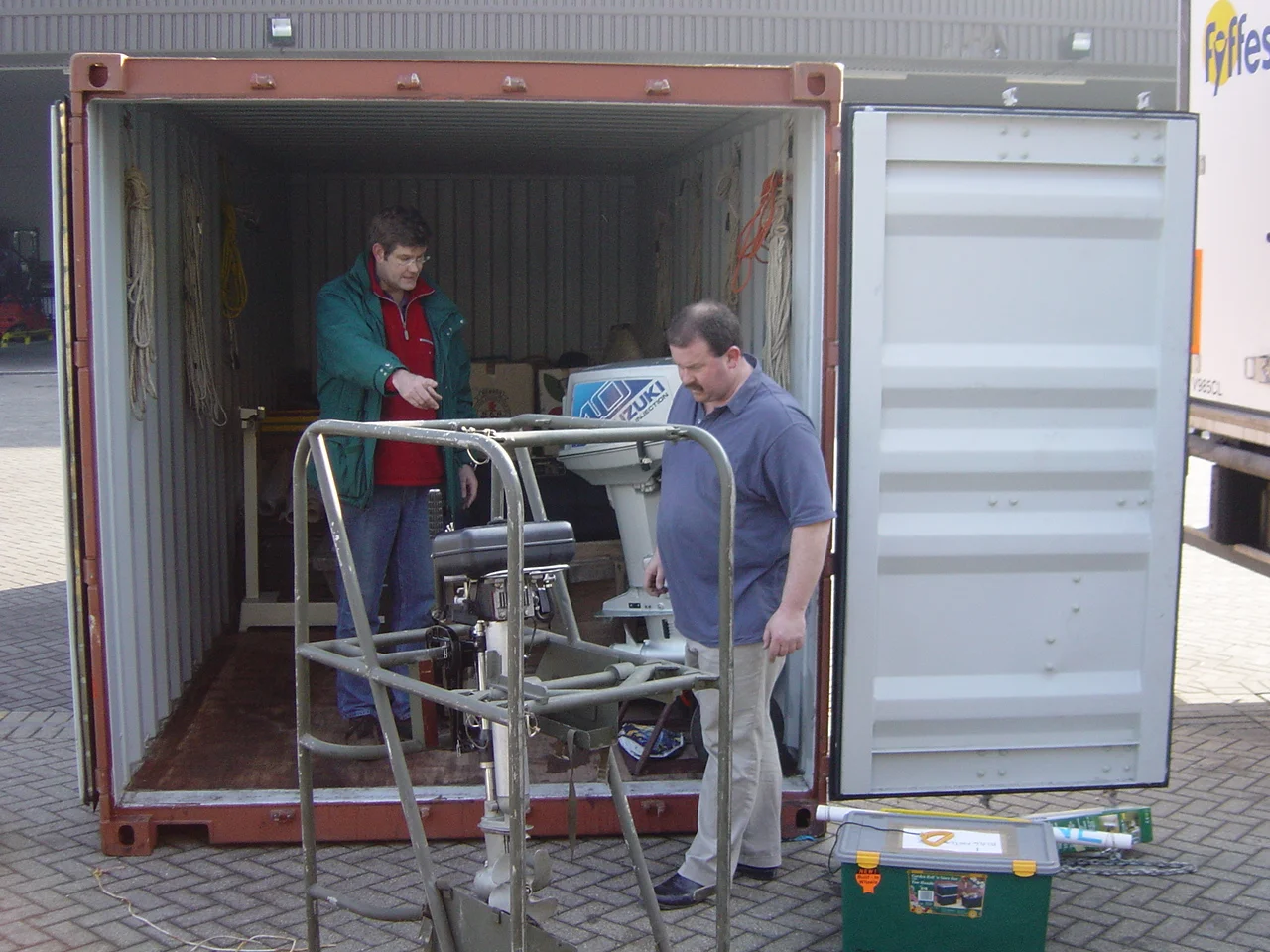 Jeremy & Simon start filling the containers