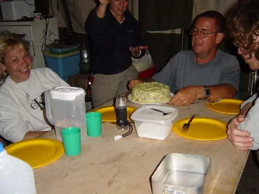 Vandel prepares to cut his home made cake