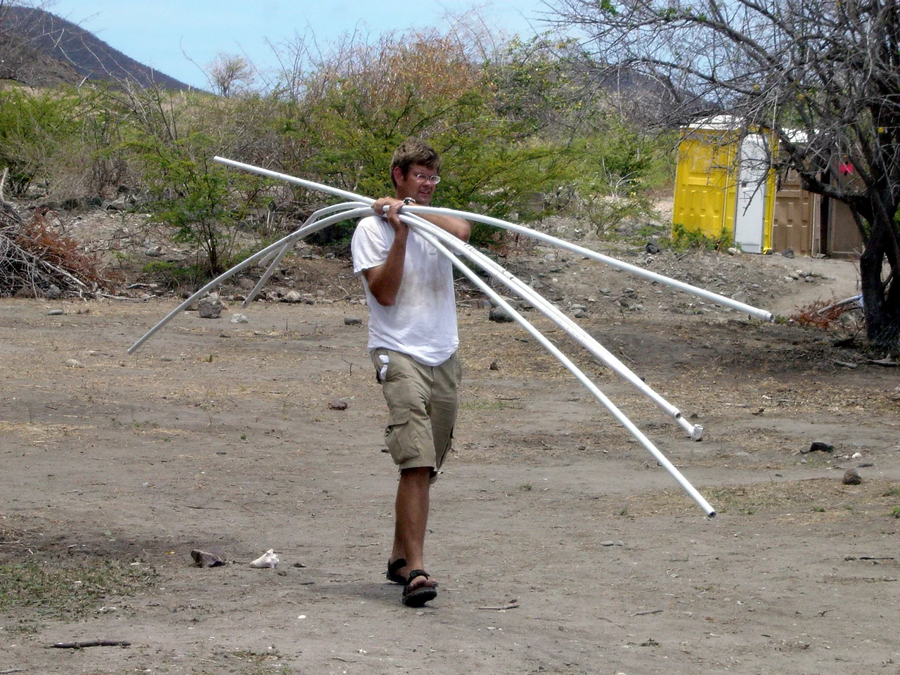 Simon connecting the water supply to the shower which was some distance away