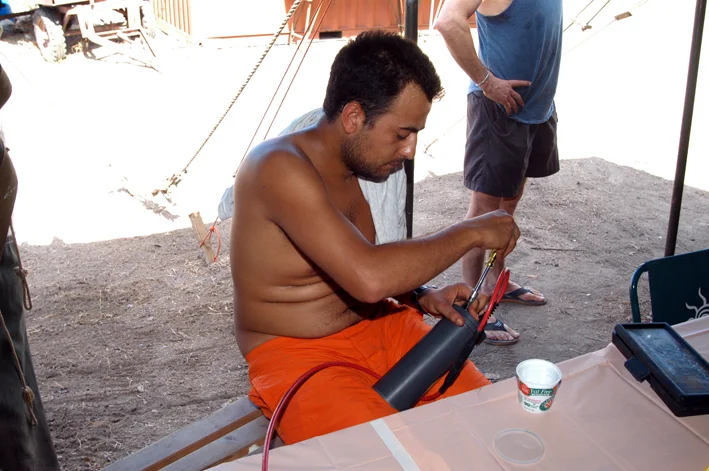  Roberto inspects some of the electronics for the report on equipment sent for us to evaluate and test 