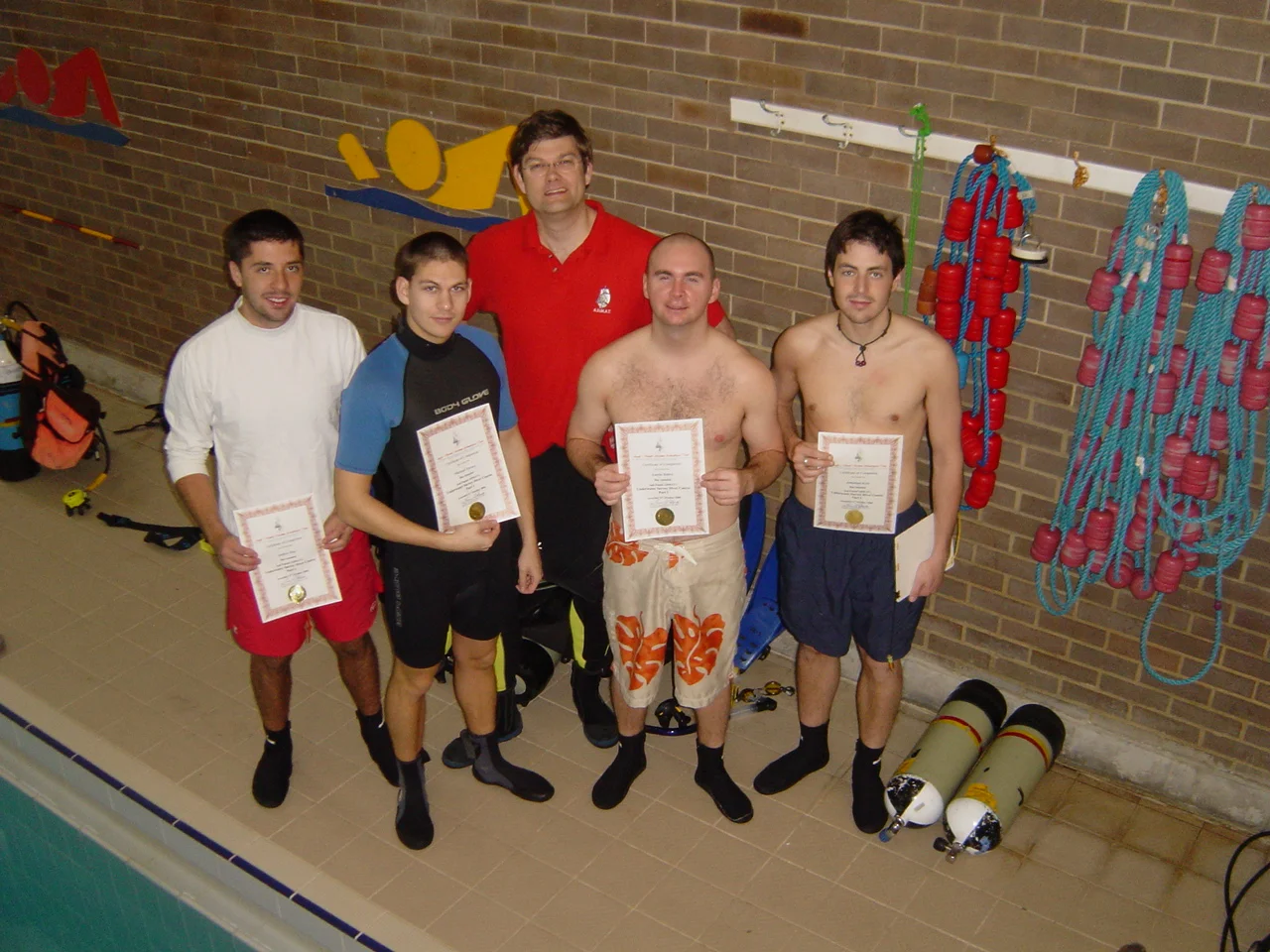 Dr Spooner with the successful students, Austin Buhta, Michael Turner, Andrez Diaz and Jonathan Kyte, who are shown here with their certificates after a long and through weekend.