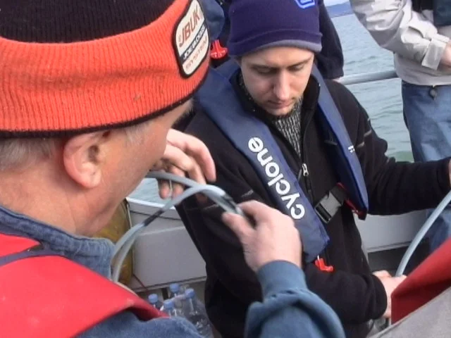  Bob instructs the students how to deploy the smaller Aquascan Proton Magnetometer 