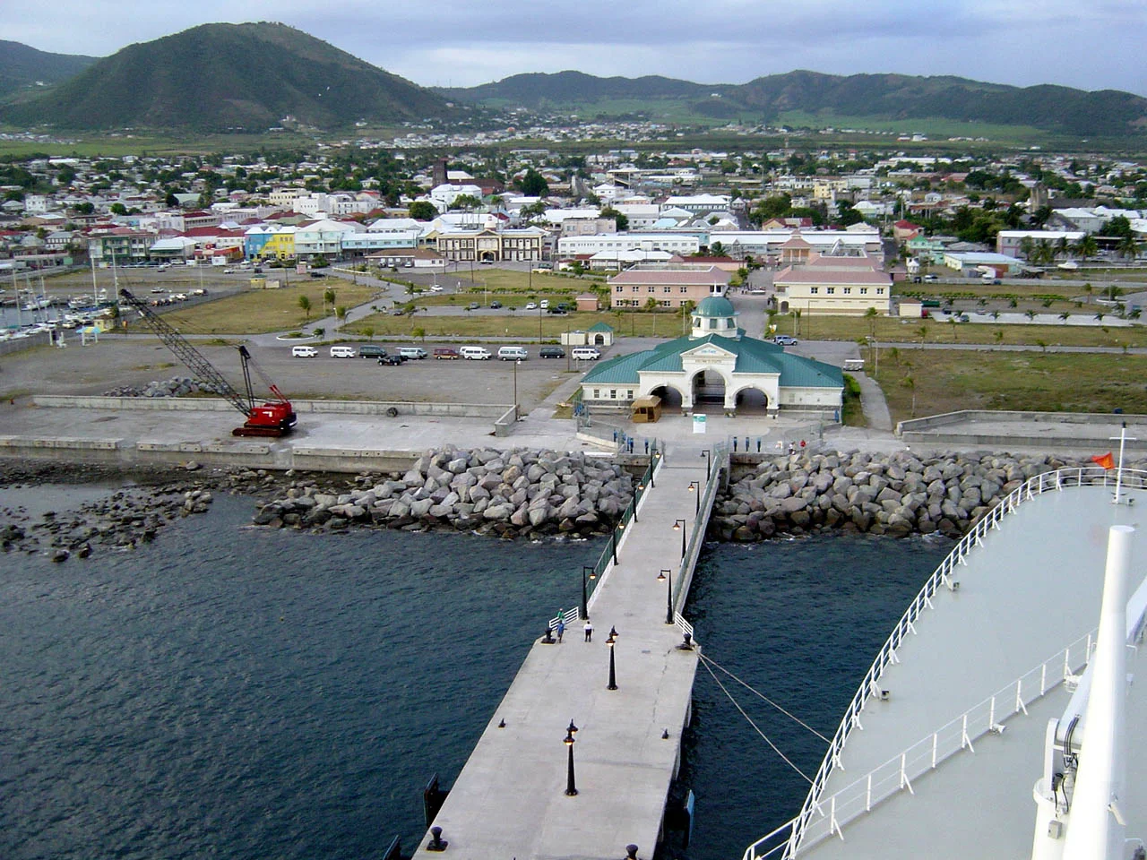The QM2 tied to the dock at St Kitts