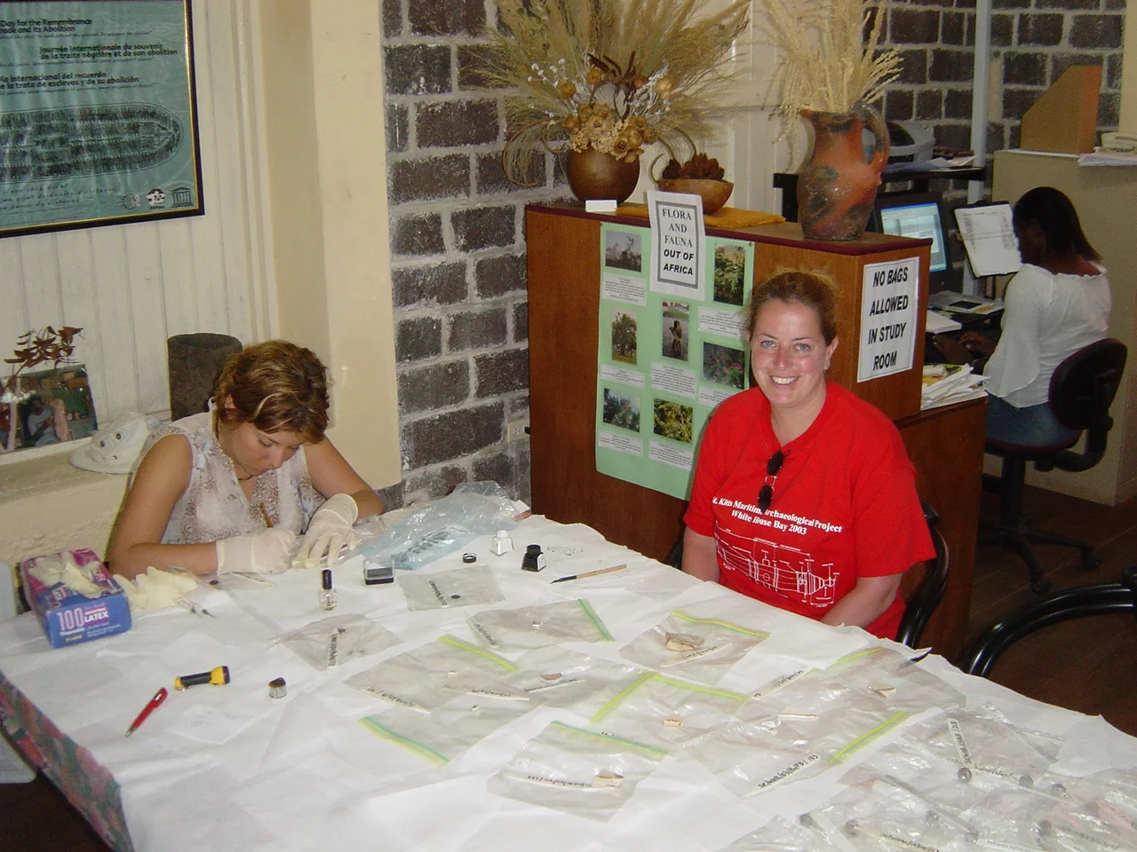 Khrisitn and Kathy with Dr Spooner, working on the artefacts from the White House Bay Wreck, in the St. Christopher Heritage Society on St. Kitts.