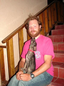 Basil appreciating his new fan club, maritime archaeologist Mats Nelson