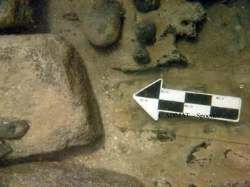 Smaller ballast river stones were found