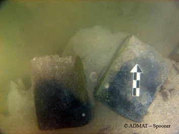 At first the blackened parts of the blocks were thought to be fire soot related, but upon closer inspection on the surface it appeared to be organic discoloration