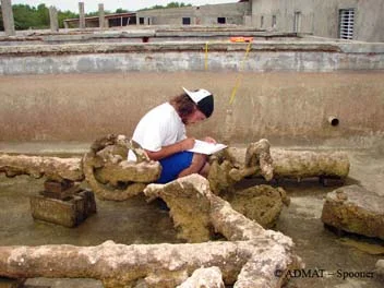 Student Max recording the anchors and cannons from The Tile Wreck during conservation water change