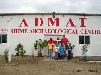 Principal Jonny E. Marte with his class and ADMAT's Dr Simon Q. Spooner and Rami Rodriguez in front of the ADMAT centre.