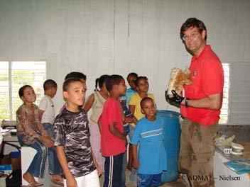 Simon with a large enema pump from The Faience Wreck, the students found this artefact highly amusing.