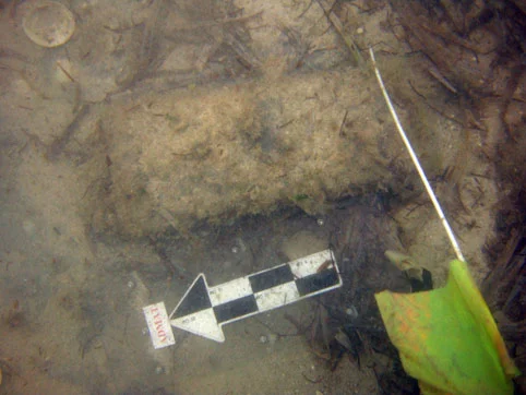 One of the scattered iron ballast bars on the sea bed, uncovered by the winter storms