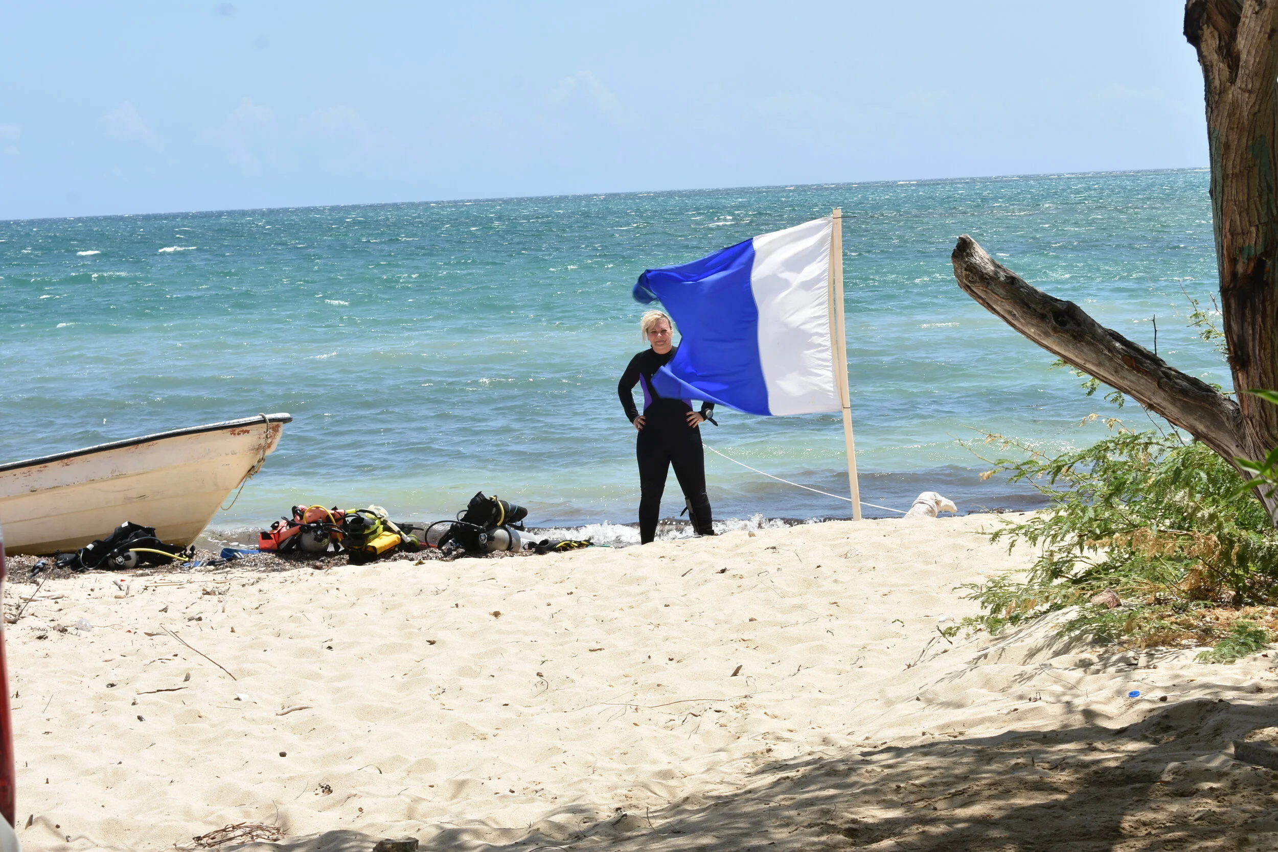  Dr Florence Prudhomme after her dive, waiting to change tanks so she can continue her recording work on the grid. 