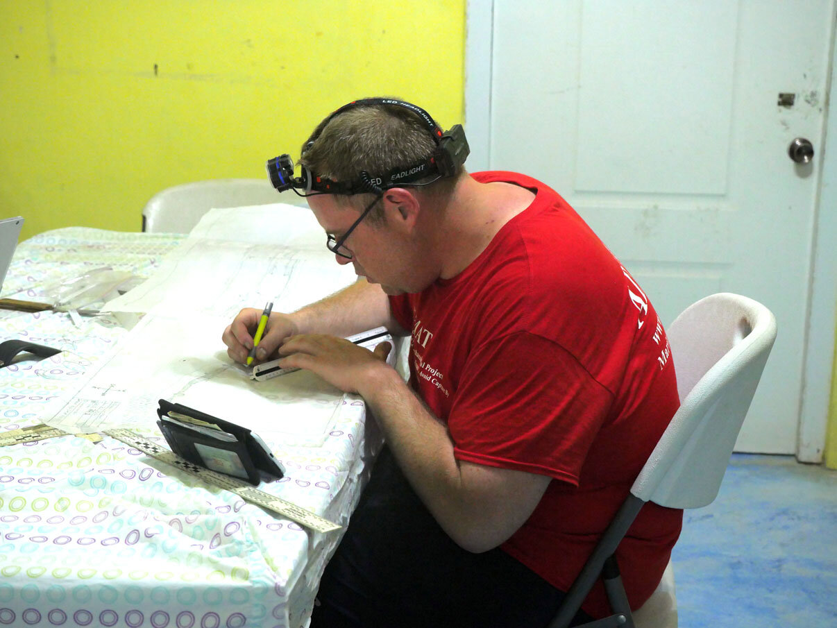 Steve Abell hard at work one evening on hs scale drawings.