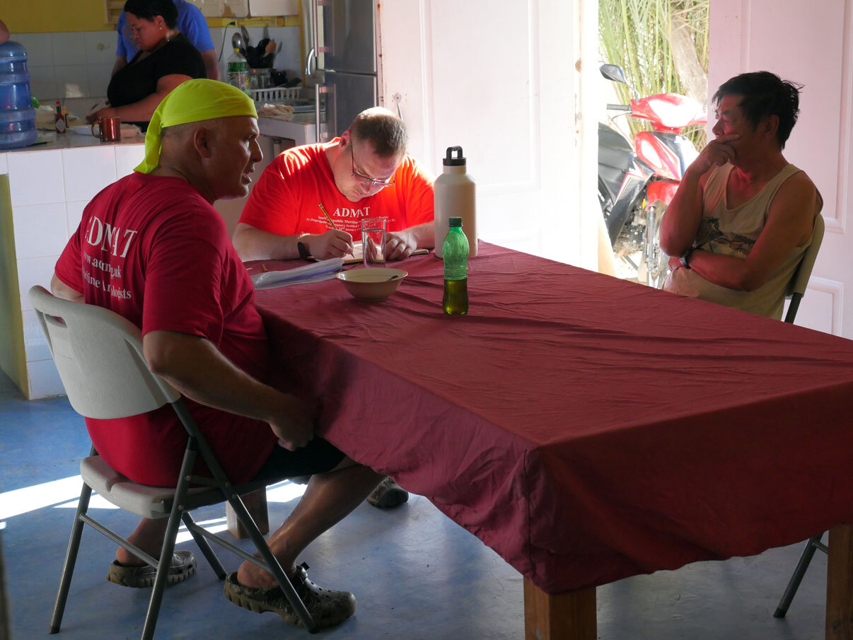 Early morning planning session prior to departing to the wreck site.