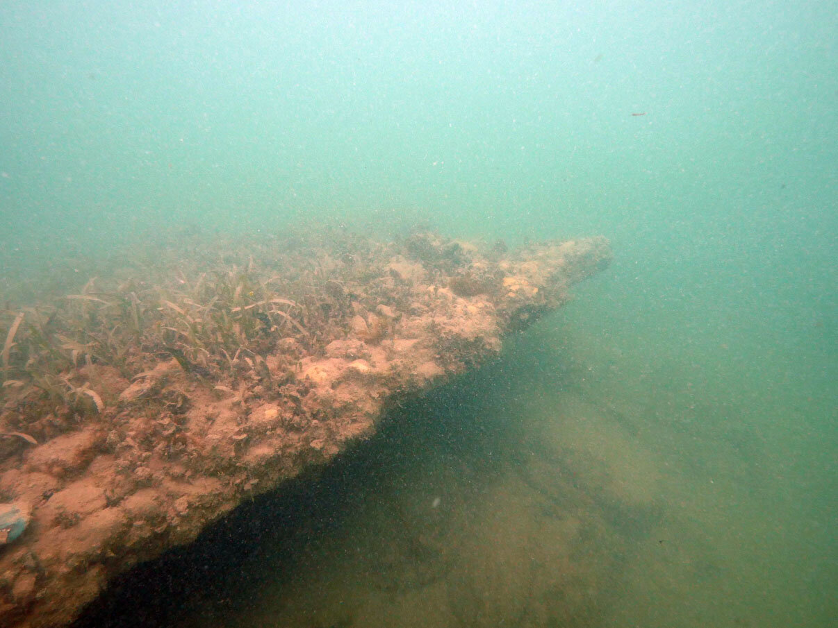 The port side amidships ballast bars which concreted together keep the hull structure and defy gravity.
