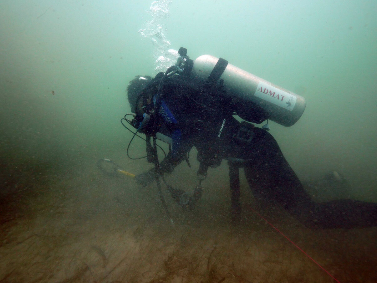 Robert “Bob” Yee conducting a geophysical survey on the starboard side of the wreck.
