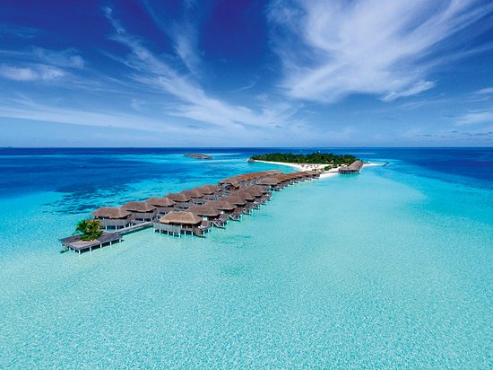 a typical over water bungalows that make the maldives so desirable. check out outrigger resort for an affordable, luxury experience.