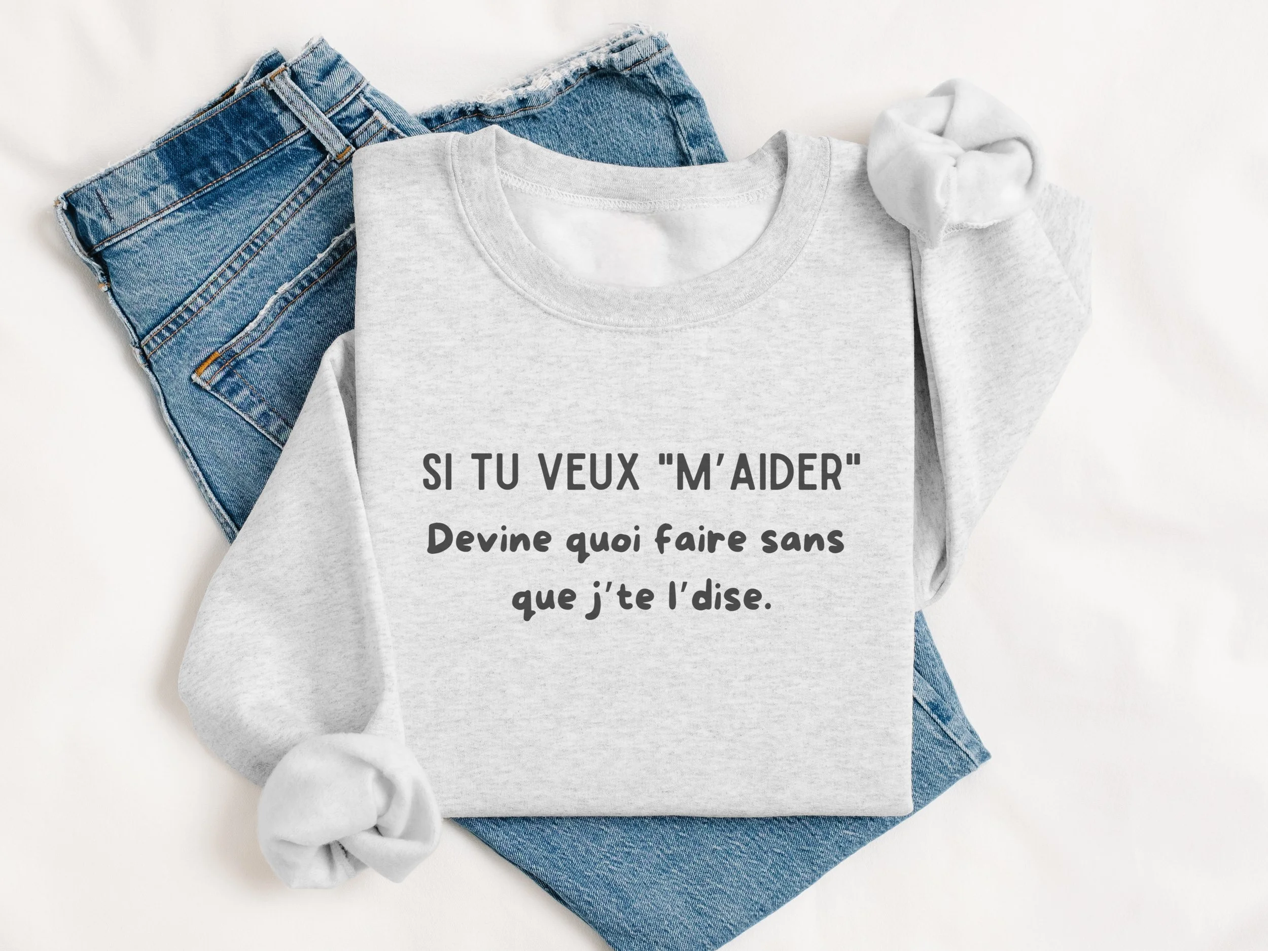 Vue avant du coton ouaté Tokade avec le texte “Si tu veux m’aider, devine quoi faire sans que j’te l’dise”.