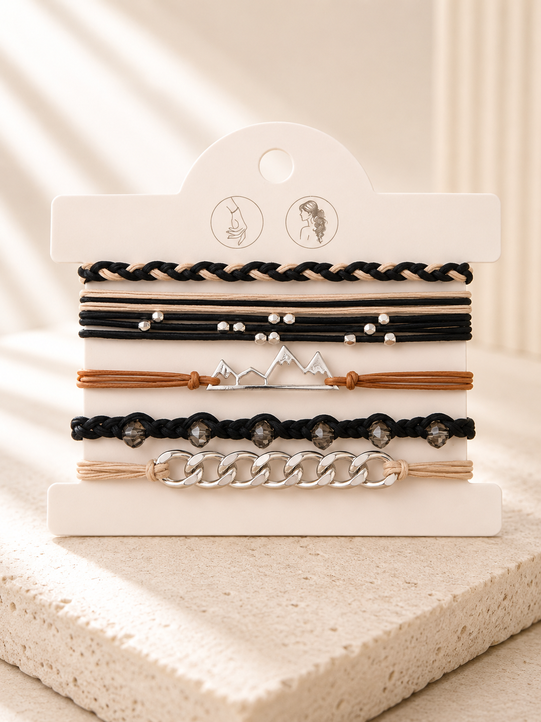 Lot de 5 élastiques à cheveux et bracelets 2-en-1 noir, beige et argent avec chaîne, cristaux facettés et breloque montagne.