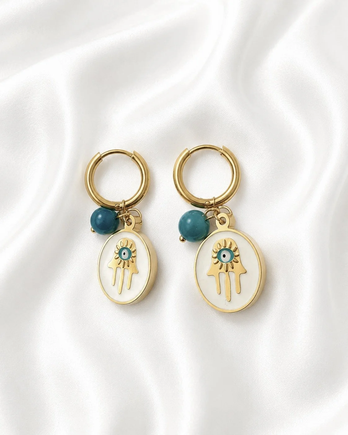 Boucles d’oreilles Donnis dorées avec pendentif protecteur et pierre semi-précieuse bleue - Tokade