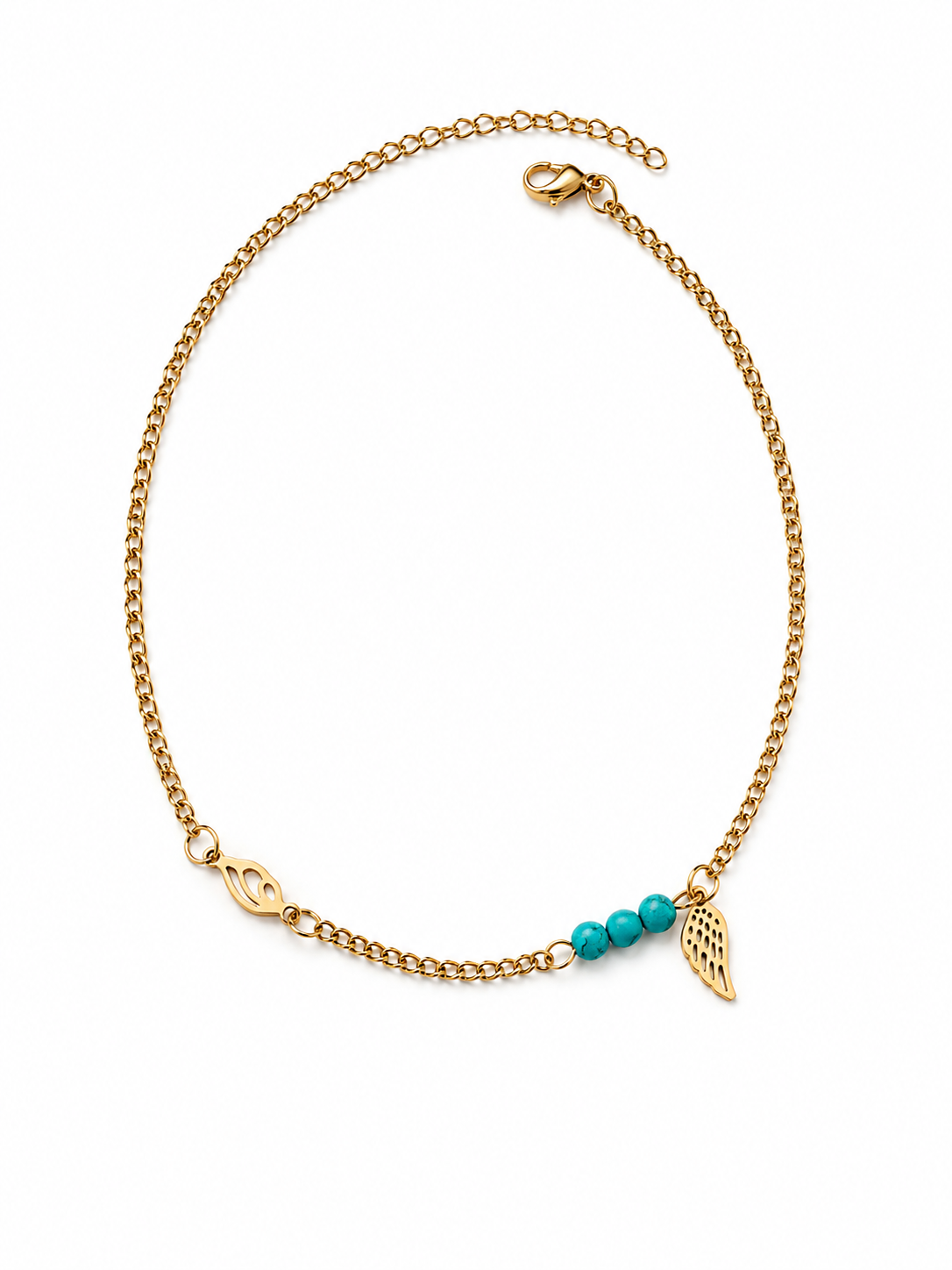 Chaîne de cheville Joy avec perles turquoise et breloques dorées présentée sur fond blanc - Tokade