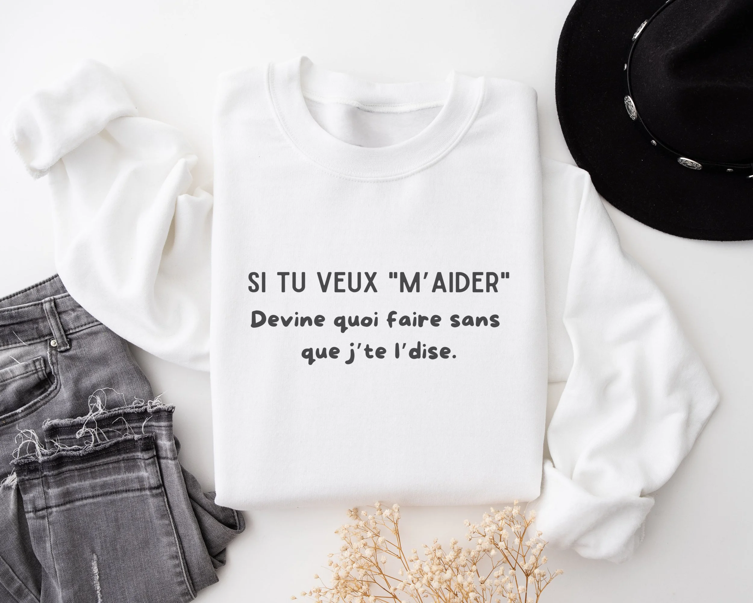 Vue avant du coton ouaté Tokade avec le texte “Si tu veux m’aider, devine quoi faire sans que j’te l’dise”.